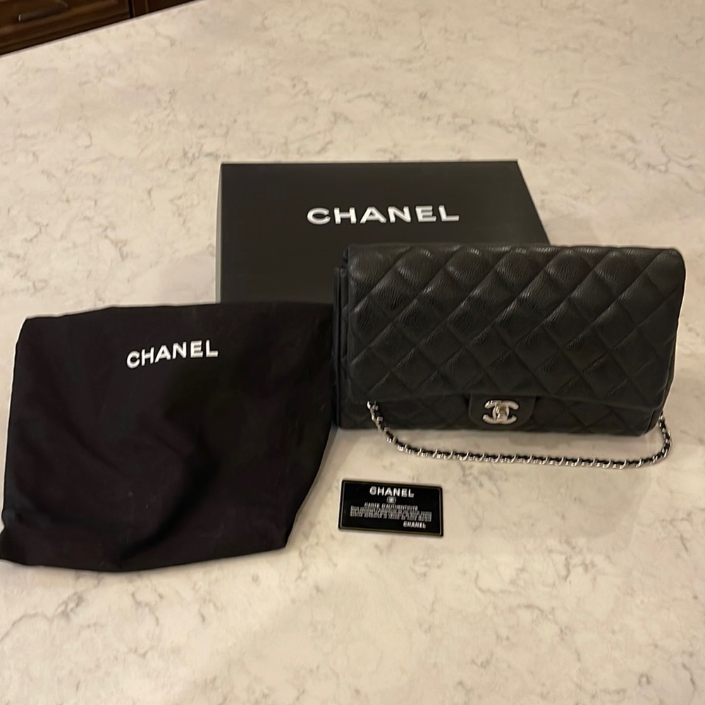 Chanel clutch in black caviar leather